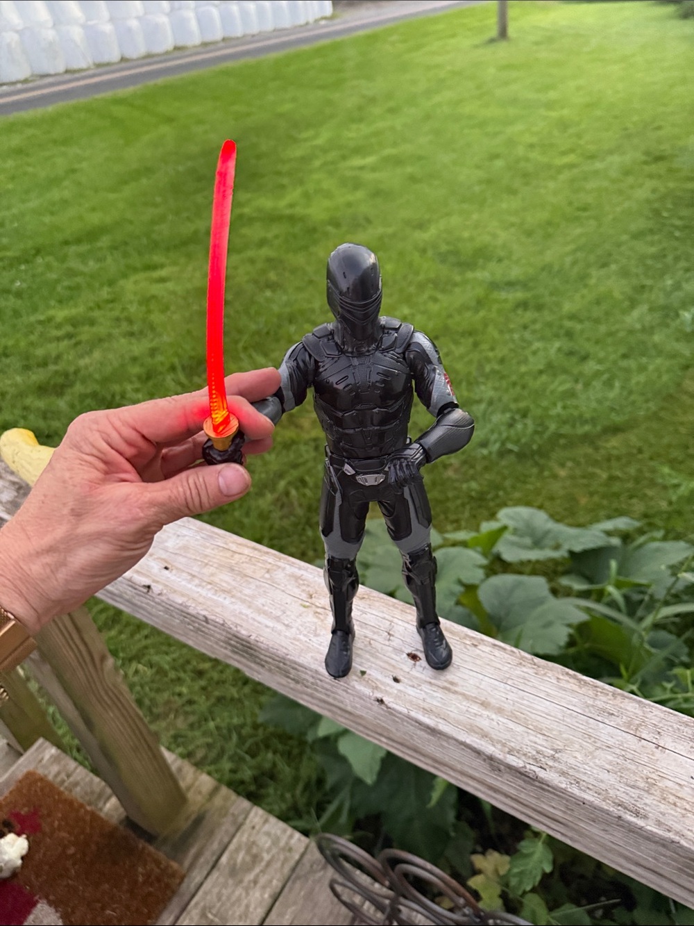 Hasbro Black Armored Action Figure with Red Light-Up Sword sneak eyes